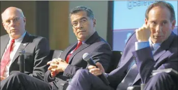  ?? Luis Sinco Los Angeles Times ?? STATE ATTY. GEN. Xavier Becerra, center, with retired Judge Steven Bailey, left, and attorney Eric Early at a candidate forum in May. Becerra, a Democrat, will face Bailey, a Republican, in Tuesday’s general election.