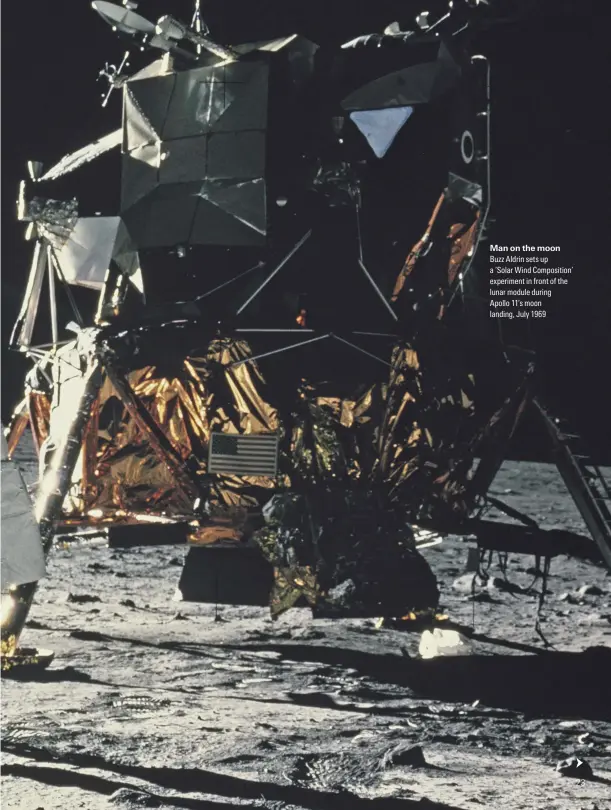  ??  ?? Man on the moon Buzz Aldrin sets up a ‘Solar Wind Compositio­n’ experiment in front of the lunar module during #RQNNQ| oU OQQP NCPFKPI ,WN[