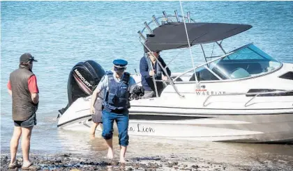  ?? Photo / Michael Craig ?? Police were called to Little Huia on the Manukau Harbour after the fatal boating accident.