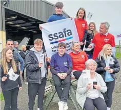  ?? ?? Connie and Cormac with the SSAFA ground crew.