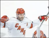  ?? Adam Hunger The Associated Press ?? Hurricanes left wing Jordan Martinook reacts after his goal in Carolina’s 4-1 victory.