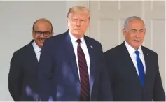  ?? ( Tom Brenner/ Reuters) ?? US PRESIDENT Donald Trump walks with Prime Minister Benjamin Netanyahu and UAE Foreign Minister Abdullah bin Zayed at the White House in Washington on September 15.