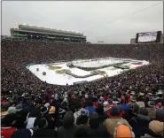  ?? NAM Y. HUH - STAFF, AP ?? FILE - In this Jan. 1, 2019, file photo, the Boston Bruins and the Chicago Blackhawks play in the NHL Winter Classic hockey game at Notre Dame Stadium in South Bend, Ind.