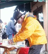  ?? File photos
/ Union Democrat ?? Friday’s Bean Feed will honor the legacy of the late Galen “Mut” Mutzner (above), founder of the feed, shown above at the event in 2014. Hungry people wait in line at the 2015 feed for a free cup of beans (left).