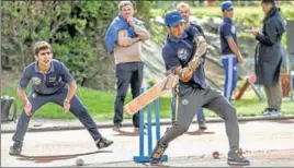  ?? AFP ?? Afghan and Pakistani migrants take part in a cricket training session in SaintOmer.