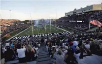  ?? L. TODD SPENCER/STAFF FILE ?? Stadiums, like this one seen here last summer at Old Dominion University, are usually packed. But during the pandemic, the seats are empty, and businesses are feeling the loss.