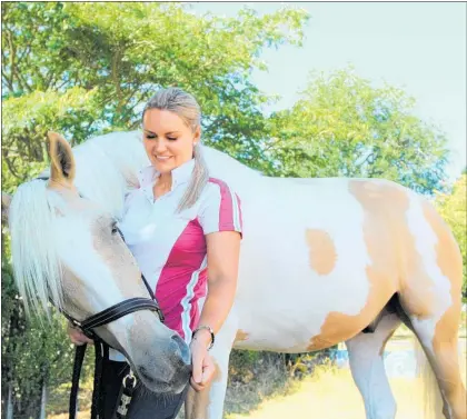  ?? Photo / Tom Rowland ?? Maija Vance at home with her Palomino named Panda.