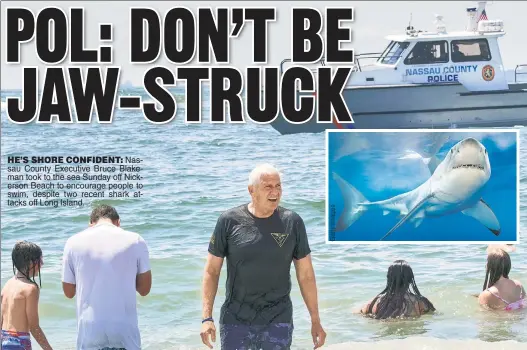  ?? ?? HE’S SHORE CONFIDENT: Nassau County Executive Bruce Blakeman took to the sea Sunday off Nickerson Beach to encourage people to swim, despite two recent shark attacks off Long Island.