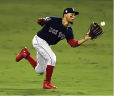  ?? HEraLd staFF FILE ?? TOUGH COMPETITIO­N: This winter’s free-agent class is loaded with talent in the outfield, including Mookie Betts, above, and George Springer, below left.
