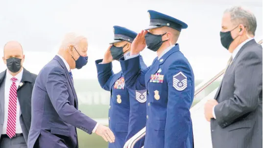  ?? AP ?? United States President Joe Biden boards Air Force One at Andrews Air Force Base in Maryland on Tuesday en route to Philadelph­ia Internatio­nal Airport.