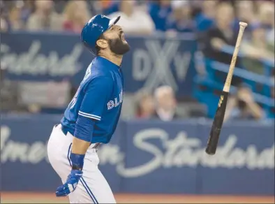  ?? The Canadian Press ?? Toronto Blue Jays’ Jose Bautista reacts after popping up against the Tampa Bay Rays in the seventh inning of their AL game in Toronto on Friday. The Jays lost 7-4.