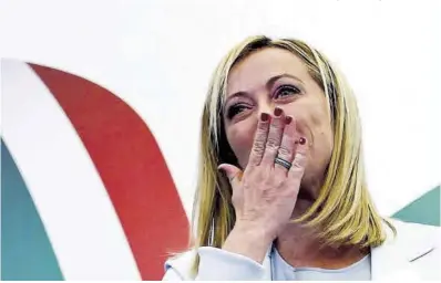  ?? Guglielmo Mangiapane / Reuters ?? La líder de Hermanos de Italia, Giorgia Meloni, en la sede del partido durante la noche electoral.