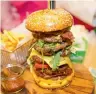  ??  ?? The $10,000 burger. Proceeds will be used to spread awareness about breast cancer