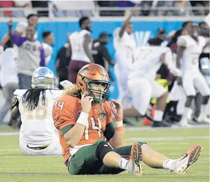  ?? PHELAN M. EBENHACK/ORLANDO SENTINEL ?? Florida A&M quarterbac­k Ryan Stanley reacts after throwing an intercepti­on that was returned for a Bethune-Cookman touchdown during the 2018 Florida Classic. The Rattlers used the defeat as motivation to deliver their best record since 1998.