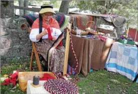  ?? SUBMITTED PHOTOS ?? Eileen Colligan of Lancaster demonstrat­es rug braiding at the Hay Creek Festival.