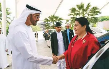  ?? WAM ?? Shaikh Mohammad Bin Zayed receives Nepal’s Bidhya Devi Bhandari in Abu Dhabi yesterday.