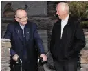  ??  ?? Monsignor Pádraig Ó Fiannachta and Fr. Jim Sheehy at the Famine Chapel on Cnoc a’ Cairn.