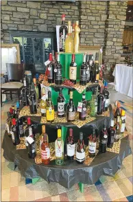 ?? Submitted photo/Ann Dahlke ?? Pictured is the wine tree at the 2023 Golf FORE Charity silent auction. The tree holds about 120 bottles of wine, with each bottle costing $20. This year the silent auction runs May 22-25 at the Bella Vista Country Club.