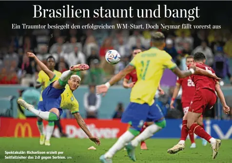  ?? DPA ?? Spektakulä­r: Richarliso­n erzielt per Seitfallzi­eher das 2:0 gegen Serbien.