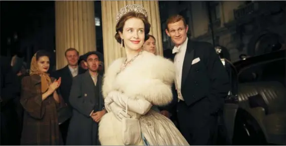  ?? ROBERT VIGLASKY — NETFLIX VIA AP ?? This image released by Netflix shows Claire Foy, center, and Matt Smith, right, in a scene from “The Crown.” The New York Times website recaps each episode of “The Crown” in text stories, but it goes the extra mile. Through the miracle of hyperlinks...