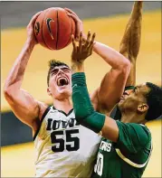  ?? CHARLIE NEIBERGALL/AP ?? Iowa’s Luka Garza ranked second nationally by averaging 24.1 points with 8.7 rebounds. He led the Hawkeyes to a No. 2 seed in the NCAA Tournament.