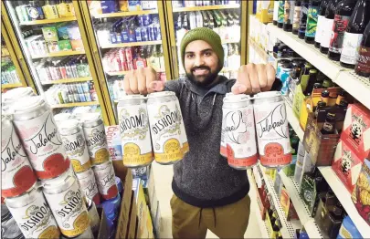  ?? Peter Hvizdak / Hearst Connecticu­t Media ?? Ravi Patel created two distinctiv­ely flavored beers for his Other Desi Beer Co., both produced at Thimble Island Brewing Co. of Branford.