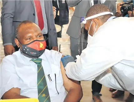  ?? Photo: PNG PM Media ?? Papua New Guinea’s Prime Minister James Marape was the first in his country to get the AstraZenec­a COVID-19 vaccine.