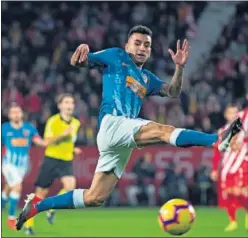  ??  ?? PROTAGONIS­TA. Correa, en una acción del partido ante el Girona.