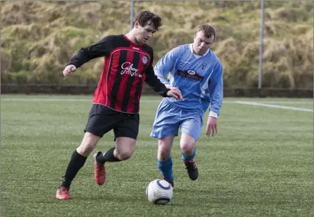 ??  ?? Donal Gallagher (right) of Benbulben FC keeps Gurteen Celtic’s Darren Madden in check during the side’s Sligo Pallets Premier League clash at the Cleveragh Astro. Photo: Donal Hackett.