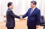 ??  ?? PEACEFUL ENGAGEMENT – Chinese President Xi Jinping (R) meets with Republic of Korea's National Security Advisor Chung Eui-Yong (L) and South Korean Ambassador to China Noh Young-min (not pictured) at the Great Hall of The People, in Beijing, China...