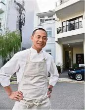  ??  ?? Chef-owner Chiang posing outside his two-Michelin-starred restaurant Andre in Singapore. — Photos: ST