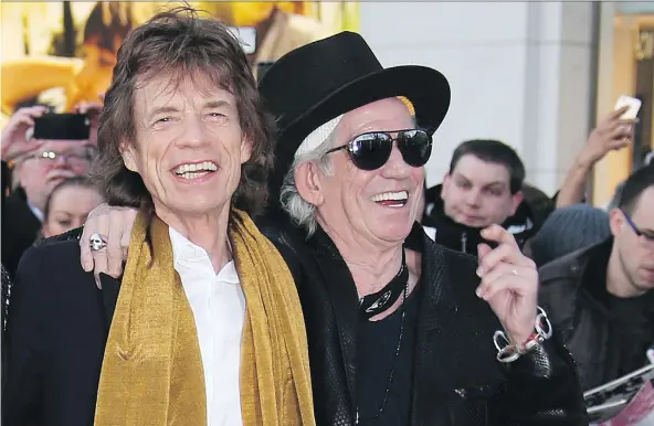  ?? THE ASSOCIATED PRESS ?? Mick Jagger, left, and Keith Richards have known each since they were young children and despite some strained moments, their friendship shows no sign of abating.