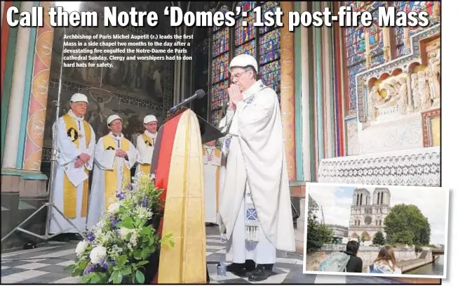  ??  ?? Archbishop of Paris Michel Aupetit (r.) leads the first Mass in a side chapel two months to the day after a devastatin­g fire engulfed the Notre-Dame de Paris cathedral Sunday. Clergy and worshipers had to don hard hats for safety.