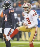  ?? Jonathan Daniel / Getty Images ?? Robbie Gould reacts after the game-winning field goal, one of his five on the day.