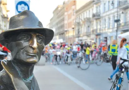  ??  ?? LODZ TODAY: At Tuwim’s Bench, a monument dedicated to Jewish Polish poet Julian Tuwim.