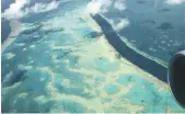  ?? Getty ?? An aerial view of the Great Barrier Reef, which stretches 2,300km along the coast of Australia