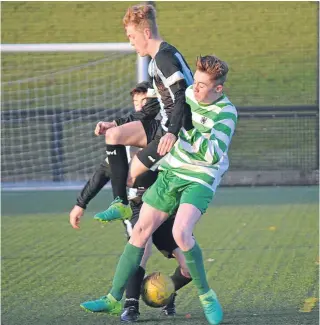  ??  ?? East Craigie Swifts U/17s (black and blue) beat Celtic 5-0 in a Henry Dolan Cup quarter-final at DISC on Sunday.