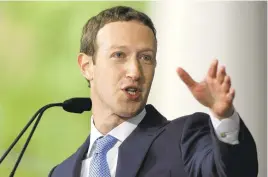  ?? STEVEN SENNE/ASSOCIATED PRESS ?? “This idea was so clear to us — that all people want to connect,” Facebook co-founder Mark Zuckerberg, a Harvard dropout, says in his commenceme­nt address.