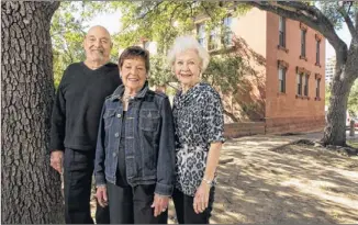  ??  ?? Bob Heller; his wife, Phyllis Heller, (center); and Carolyn Jackson were students at Radio House at the Littlefiel­d Carriage House (background).