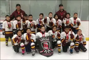  ?? Submitted photo ?? The Kainai Golden Chiefs were two-time provincial champions earlier this month. The Golden Chiefs won the Alberta Treaty Hockey Championsh­ip in Calgary in mid-April and the weekend before, captured the Alberta Native Hockey provincial title. The Golden...