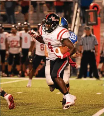  ?? MICHAEL REEVES — FOR DIGITAL FIRST MEDIA ?? Coatesvill­e’s Aaron Young (4) runs the ball in the second quarter.