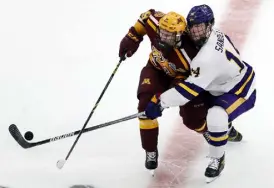  ?? Michael Dwyer, The Associated Press ?? Minnesota’s Ben Meyers, left, was signed by the Avalanche last week.