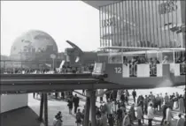  ?? THE CANADIAN PRESS ?? The minirail travels by the USSR pavilion at Expo 67 in April 1967. Some 60 countries were part of the exhibition.