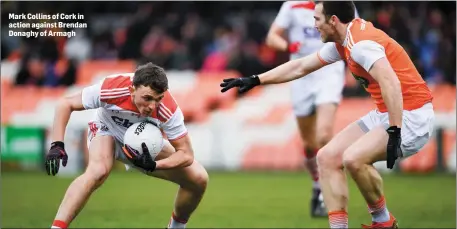  ??  ?? Mark Collins of Cork in action against Brendan Donaghy of Armagh