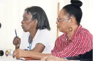  ?? PHOTOS BY CARL GILCHRIST ?? Mildred McCalla (left), Ocho Rios Craft Market, speaks as Evadney Brown McCalla of the Falmouth Art and Craft Associatio­n pays keen attention.