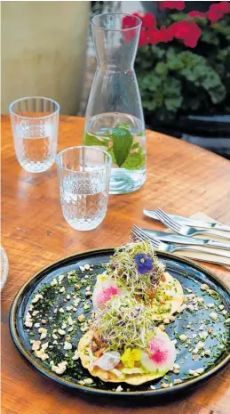  ?? PHOTO / REBECCA ZEPHYR THOMAS ?? Jackfruit tostadas with iceberg lettuce, chipotle, cajun aioli, peanuts and lots and lots of sprouts.