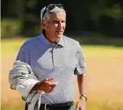  ?? Kevin C. Cox/Getty Images ?? PGA Tour Commission­er Jay Monahan looks on during the Scottish Open at The Renaissanc­e Club on July 10, 2022 in North Berwick, Scotland.