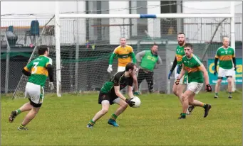  ??  ?? Hollywood’s Conor Callanan on the ball against Kilcoole.