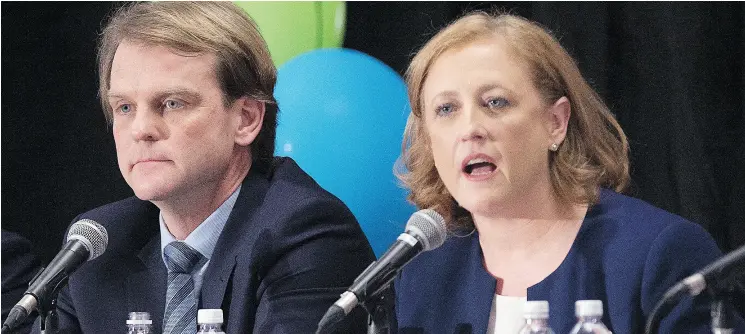  ?? ANDREW VAUGHAN / THE CANADIAN PRESS ?? Lisa Raitt speaks as Chris Alexander looks on during the Conservati­ve leadership candidates’ debate in Halifax on Saturday. Conservati­ves vote for a new party leader in May.
