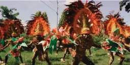  ??  ?? FIESTA SAFELY Dancers strictly maintain social distancing and health protocols as they perform